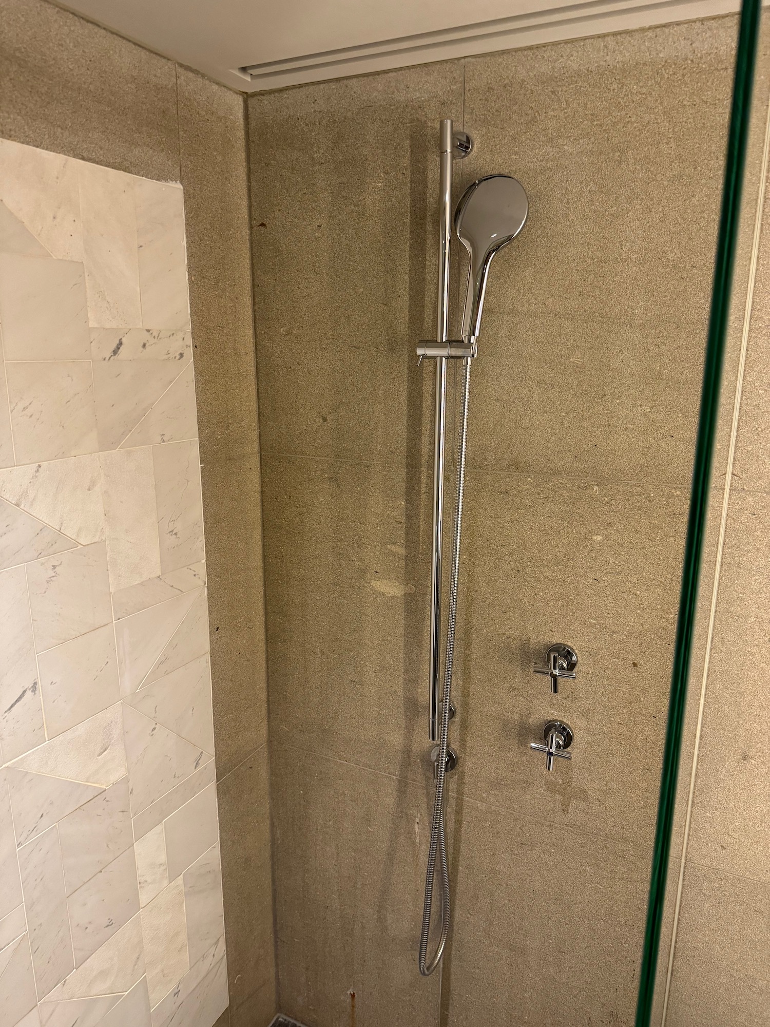 a shower with a shower head