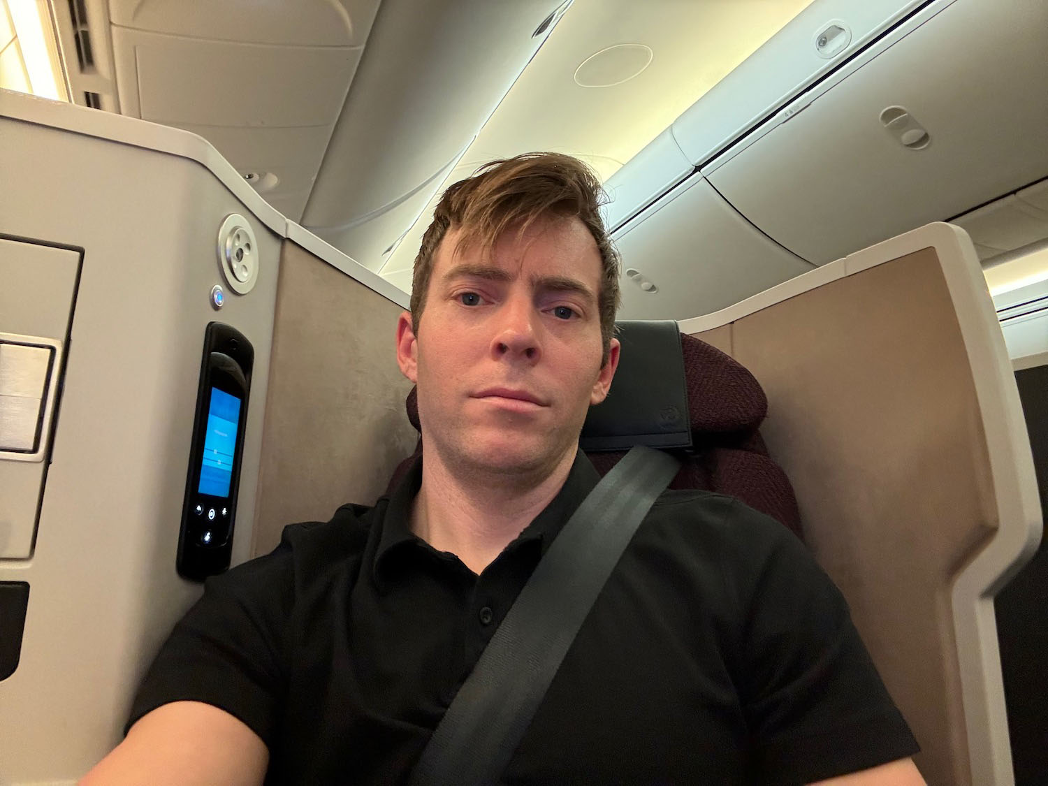 a man sitting in an airplane