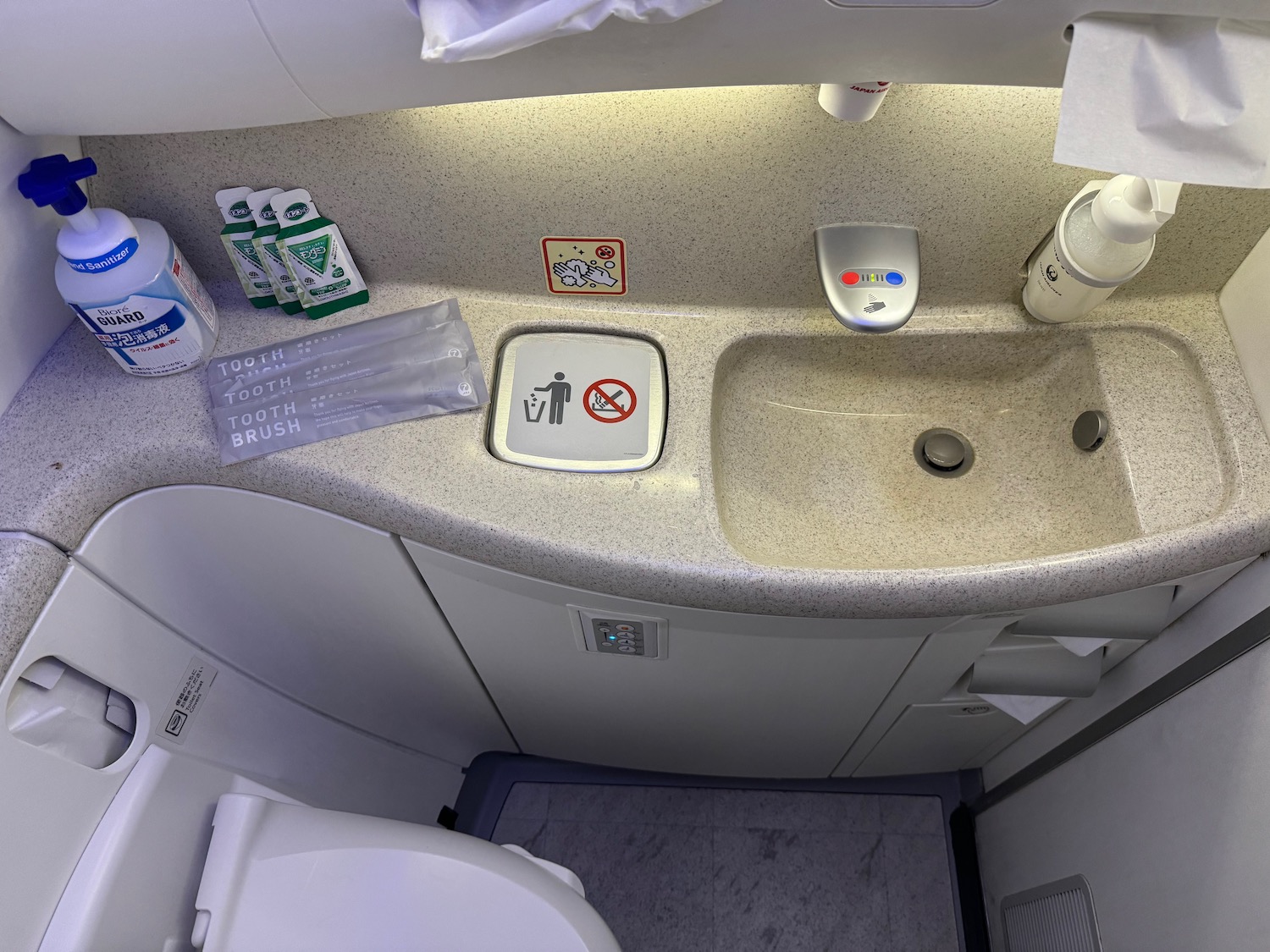 a sink and toilet in a plane