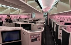 an airplane with rows of tvs and shelves