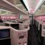 an airplane with rows of tvs and shelves