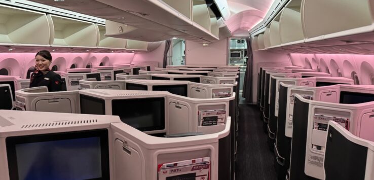 an airplane with rows of tvs and shelves