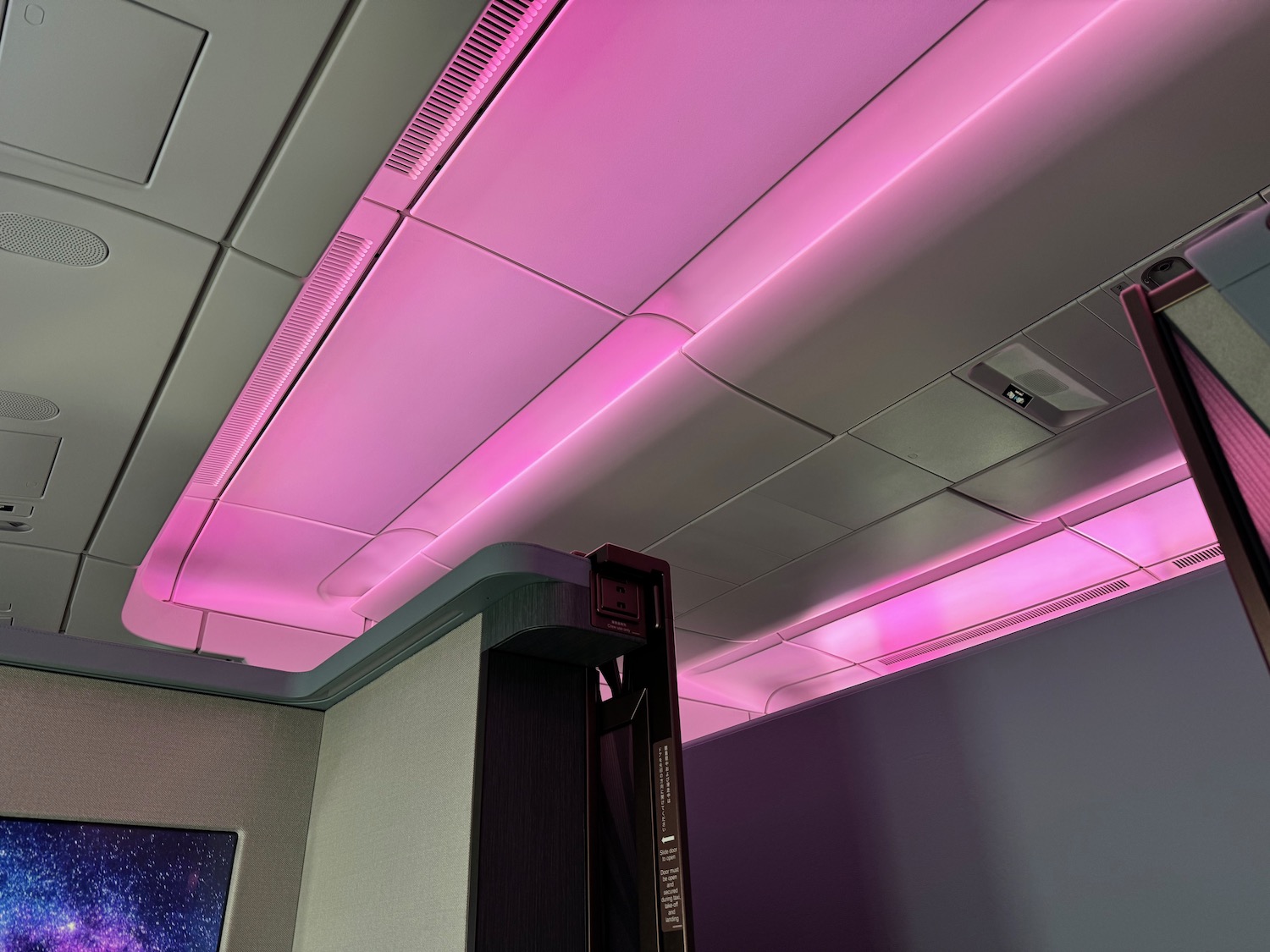 a pink light on the ceiling