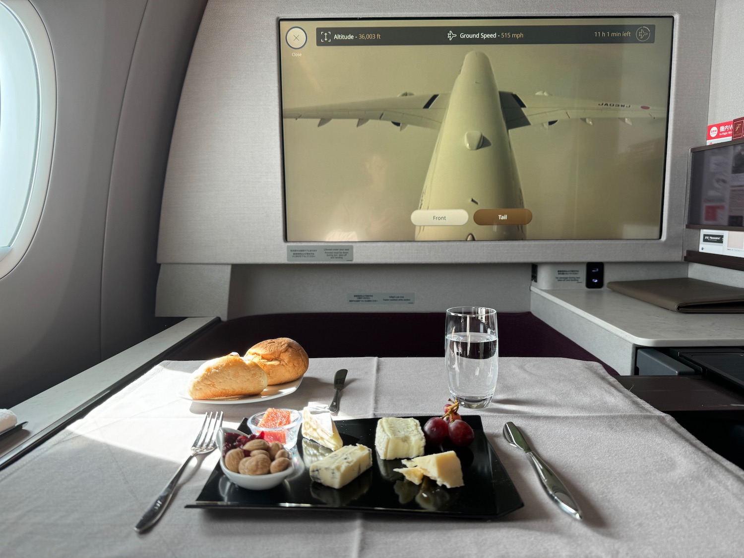 a table with food on it and a television on the wall