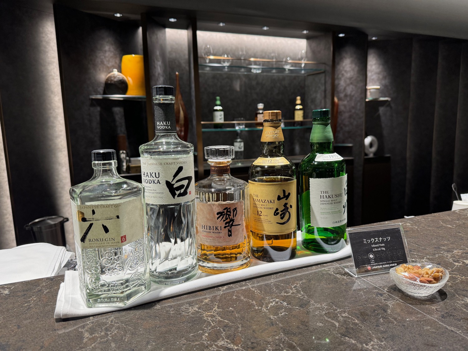 a group of bottles of alcohol on a counter