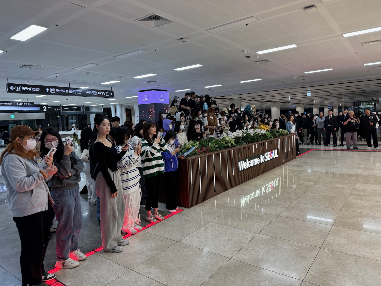 a group of people standing in a line