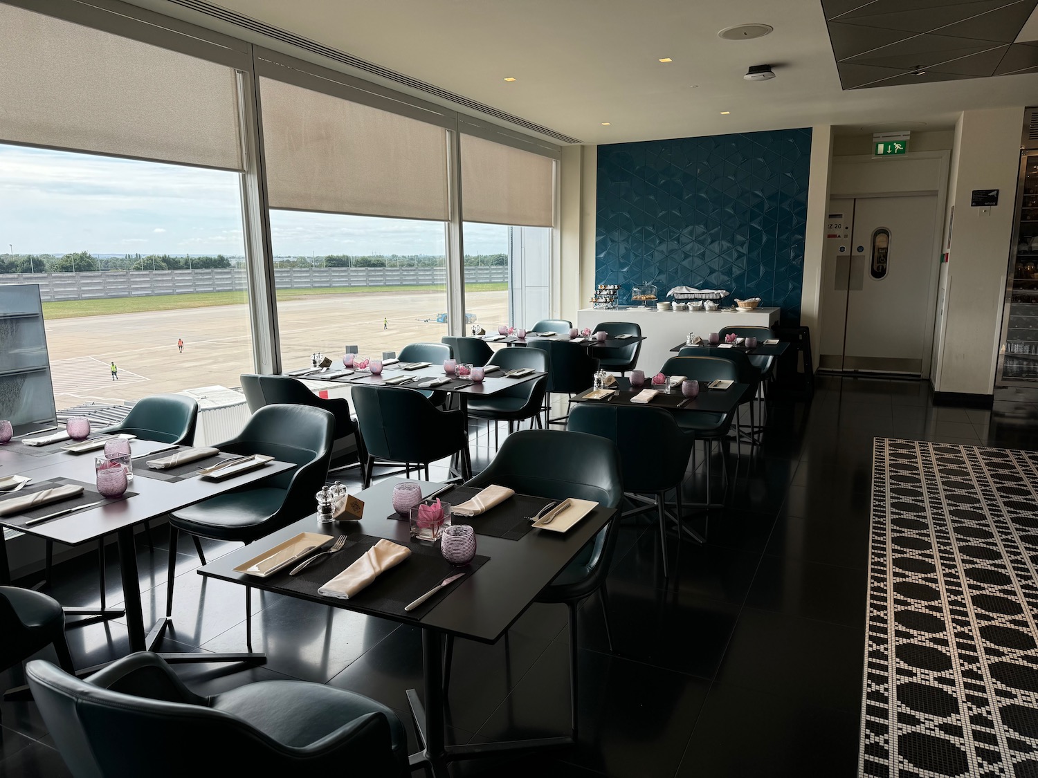 a room with tables and chairs