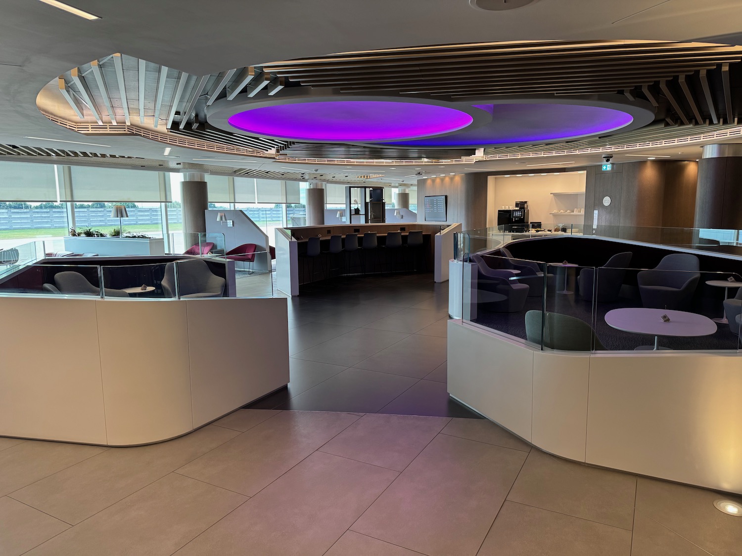 a room with purple lights and a purple ceiling