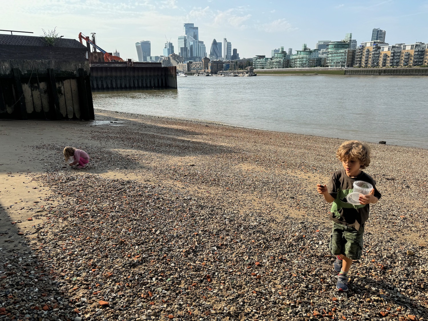 a boy and girl on a beach