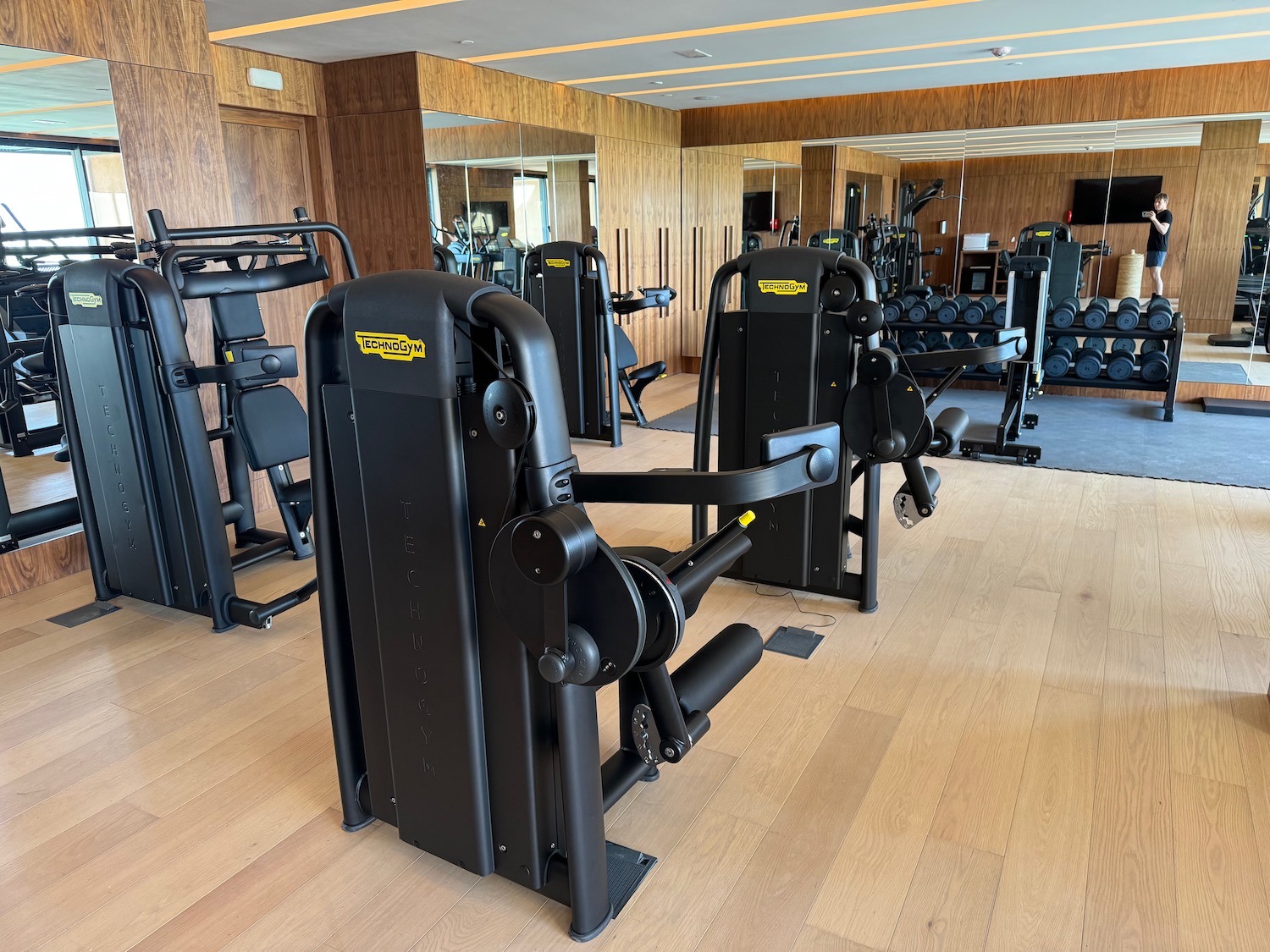 a gym with lots of training equipment