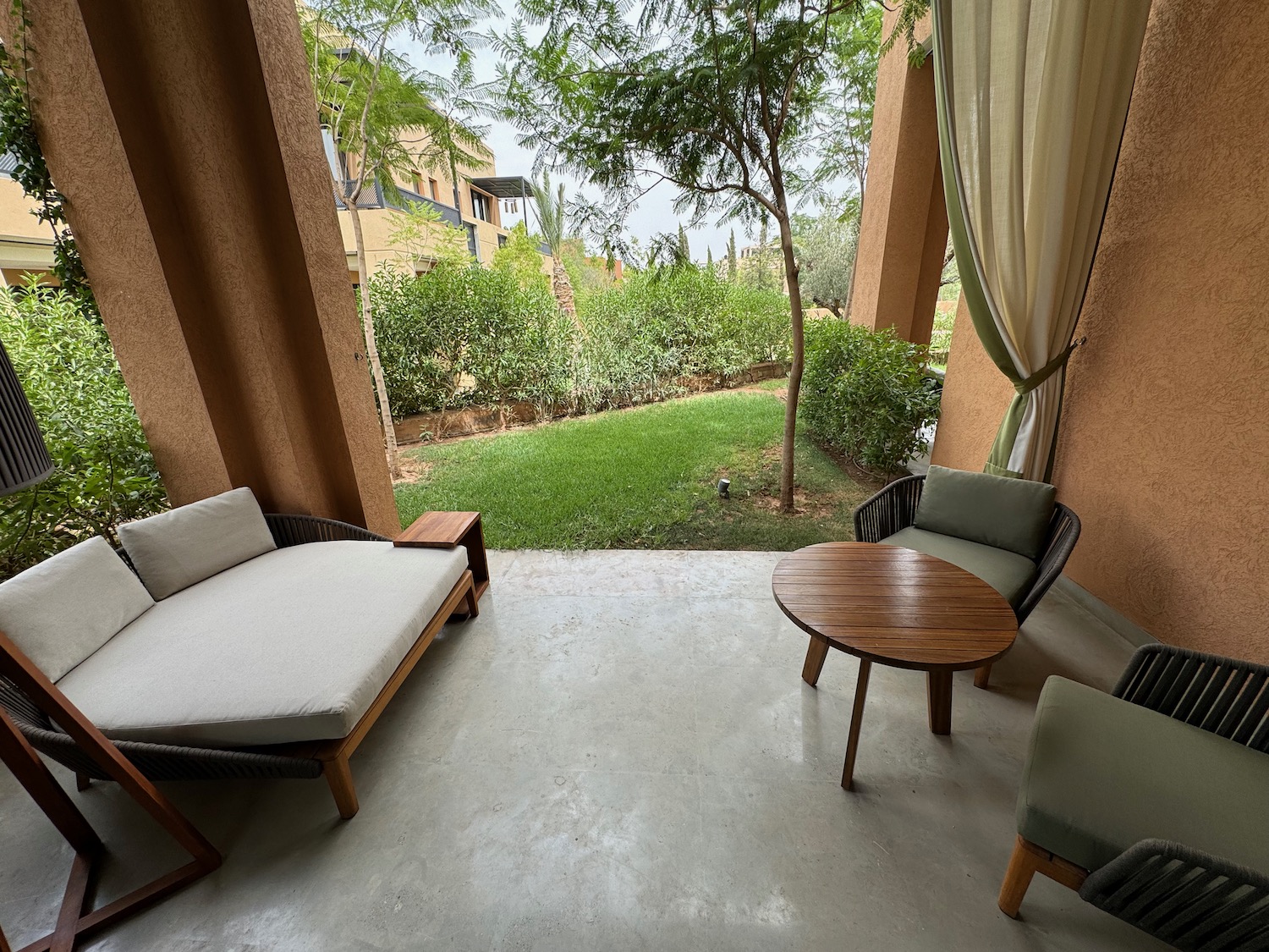 a terrace with a couch and a table