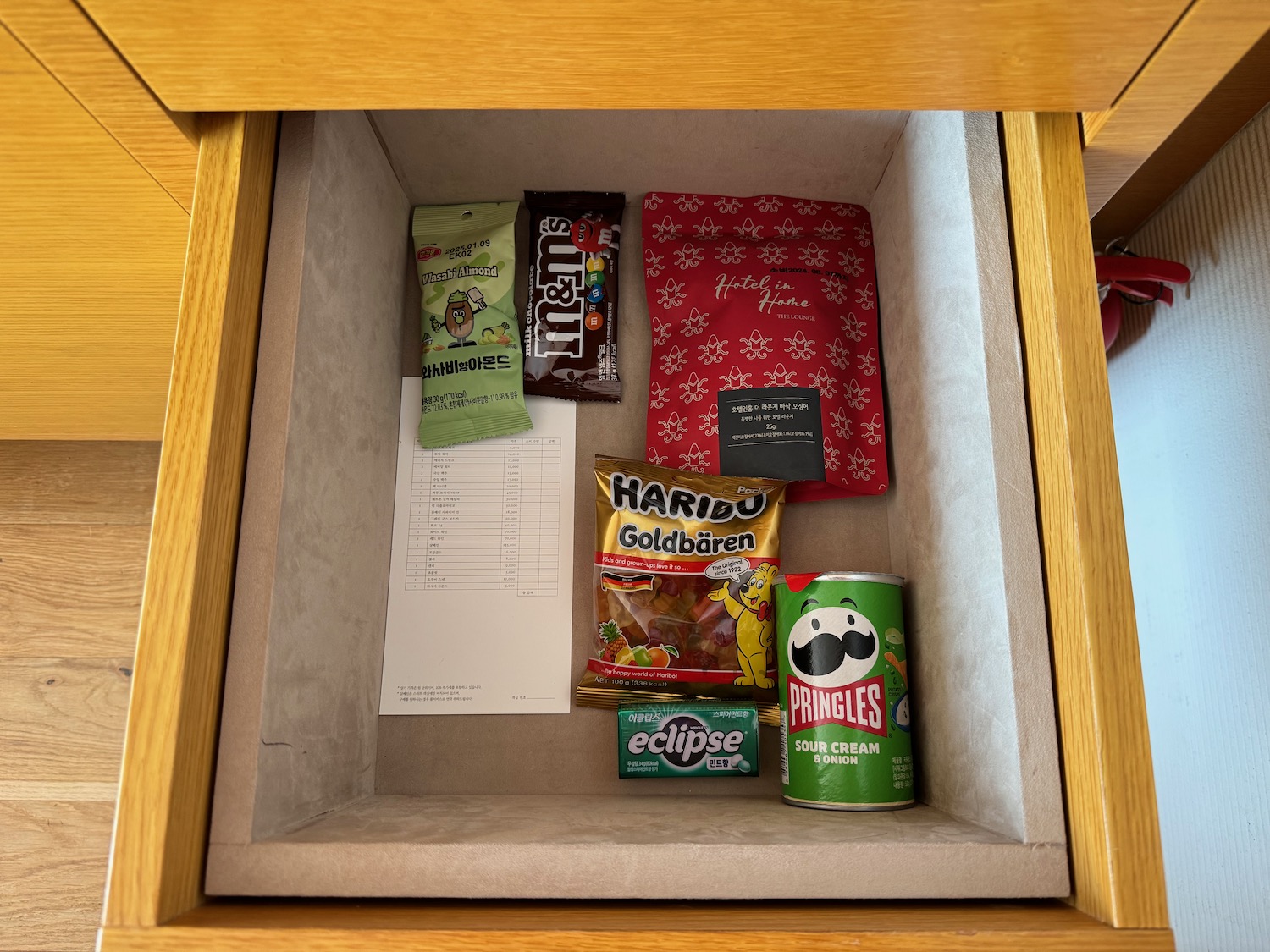 a box with food and a can in it