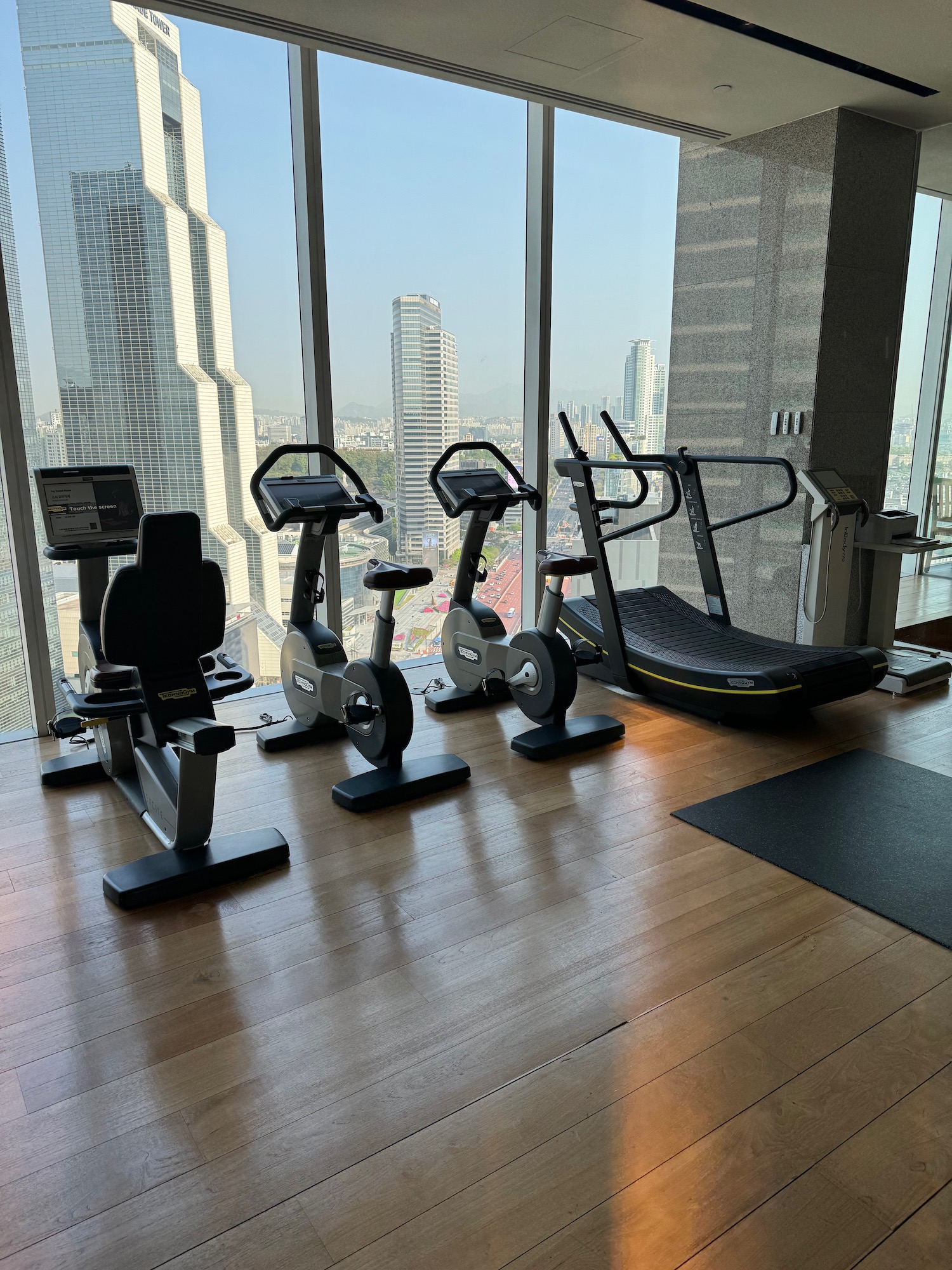 a room with exercise bikes and treadmills