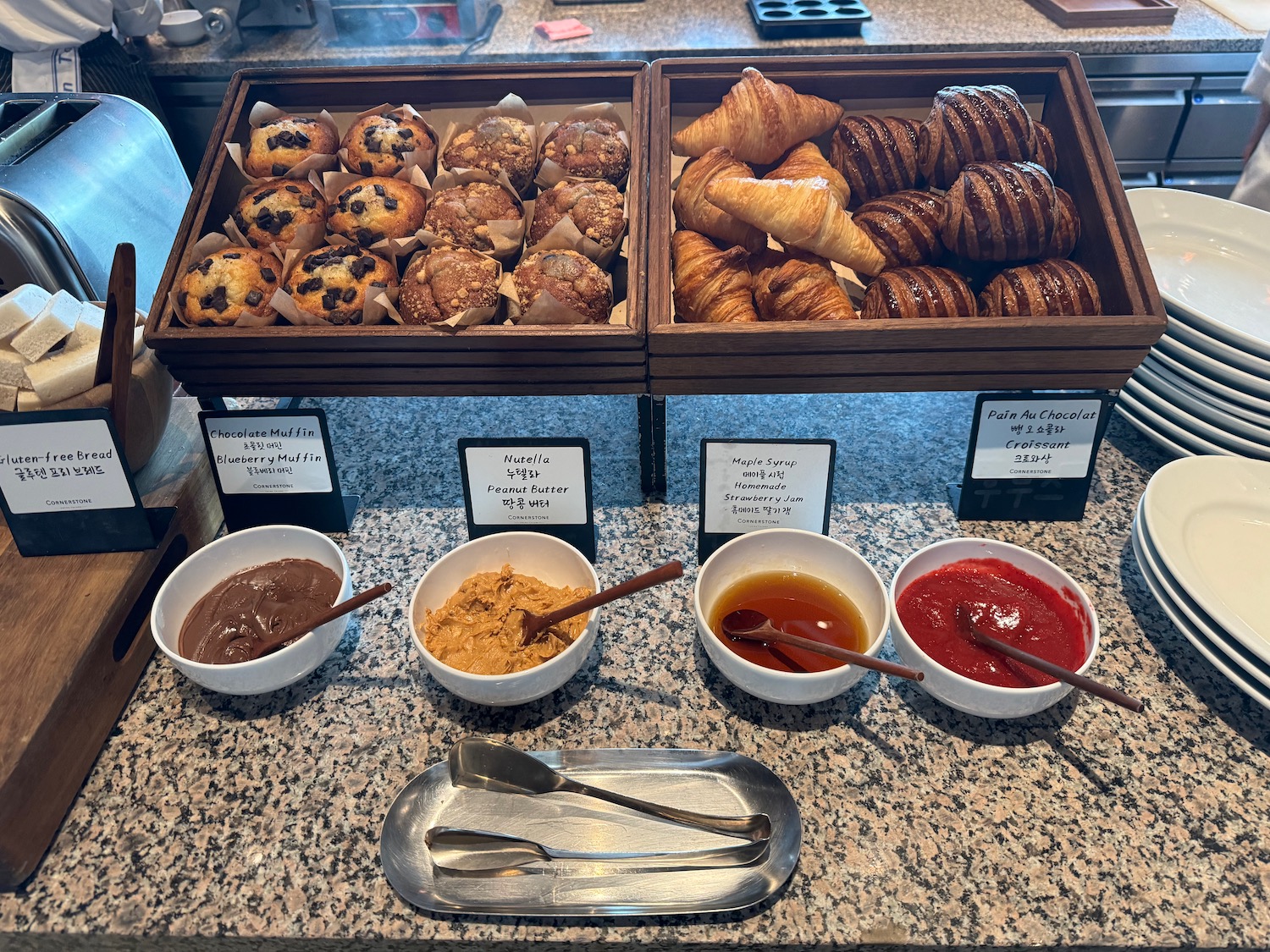 a tray of pastries and condiments