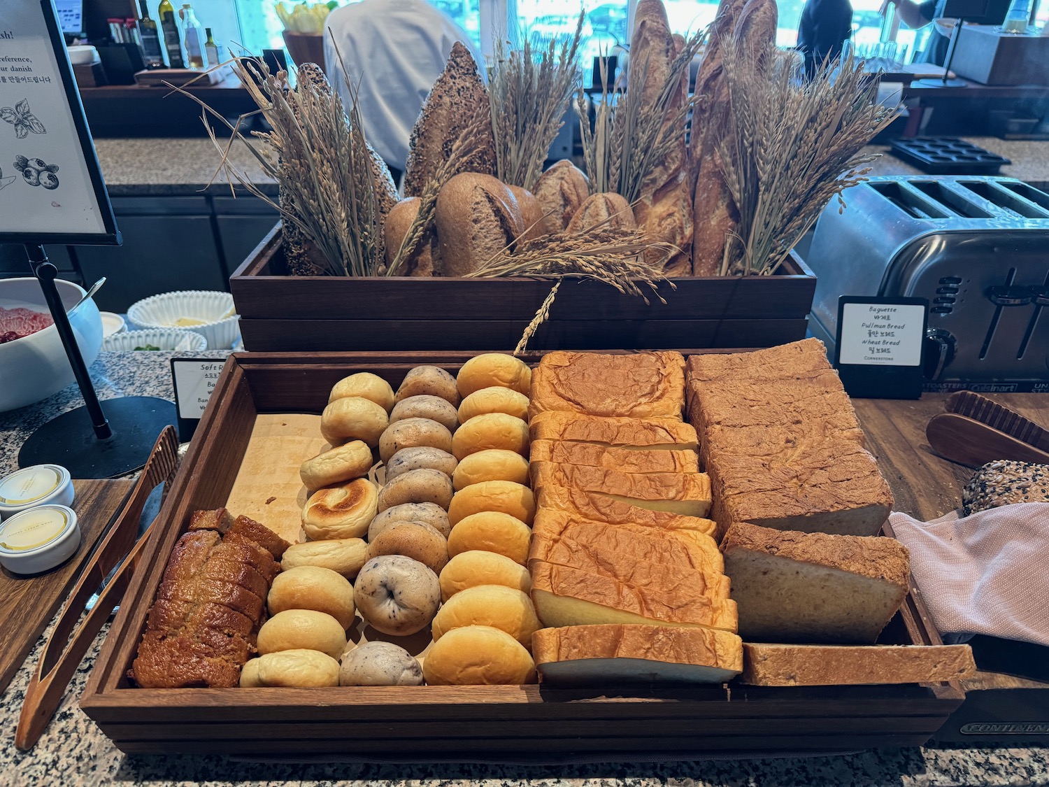 a tray with bread and rolls