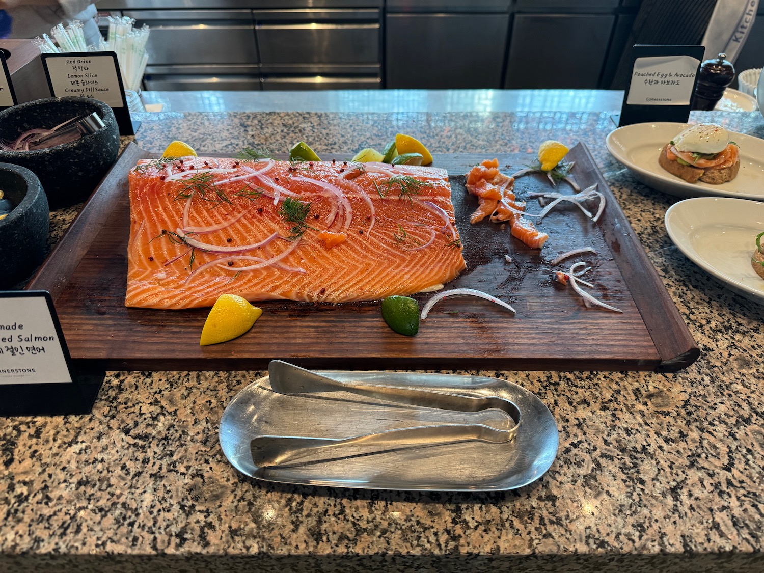 a large piece of fish on a wooden board