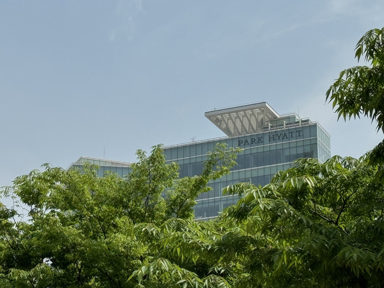 a building with trees in the background