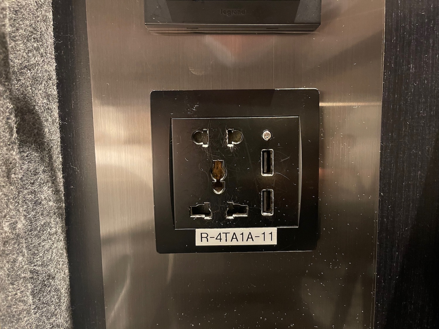 a black socket on a metal surface