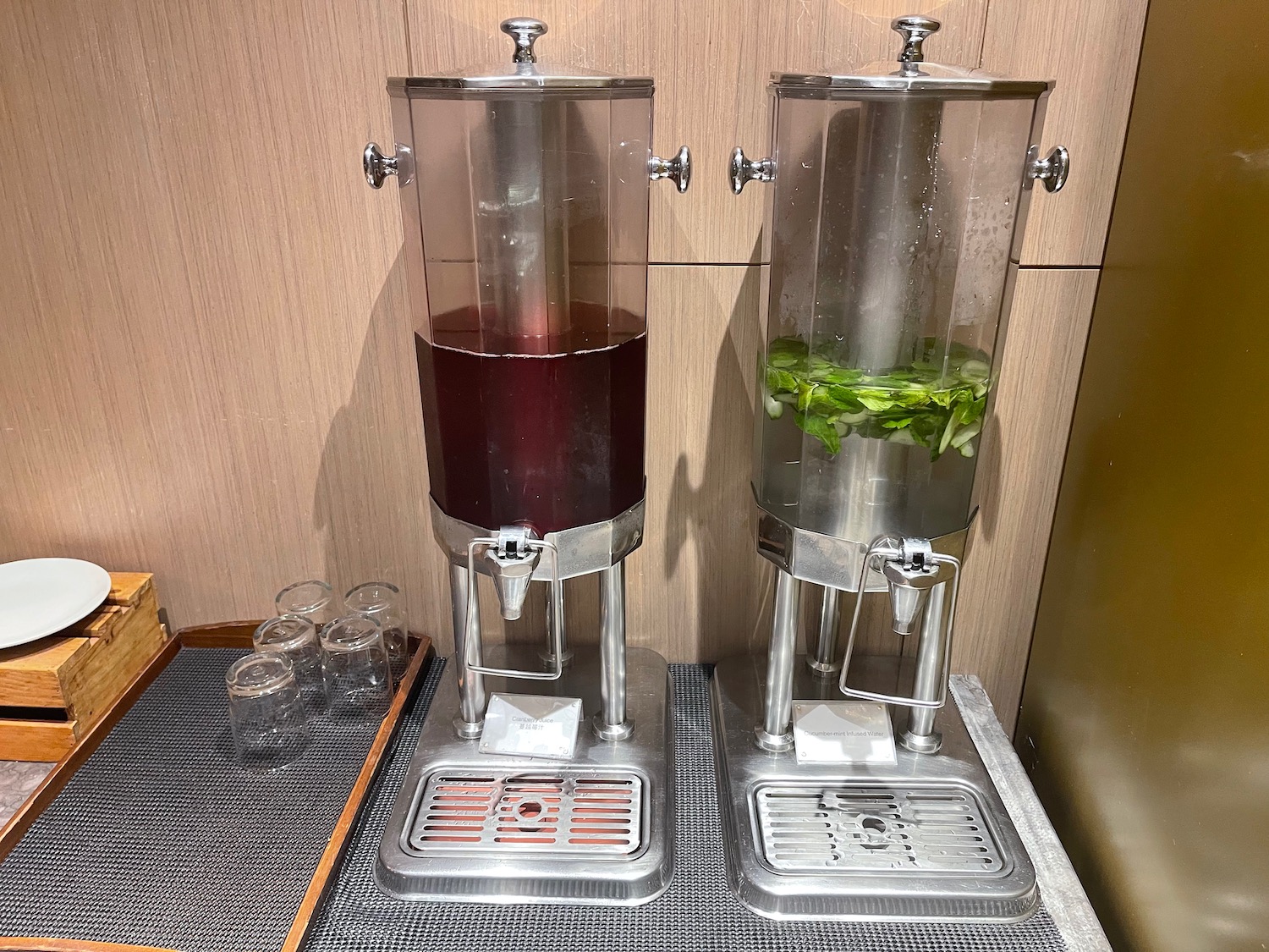 two glass containers with liquid in them