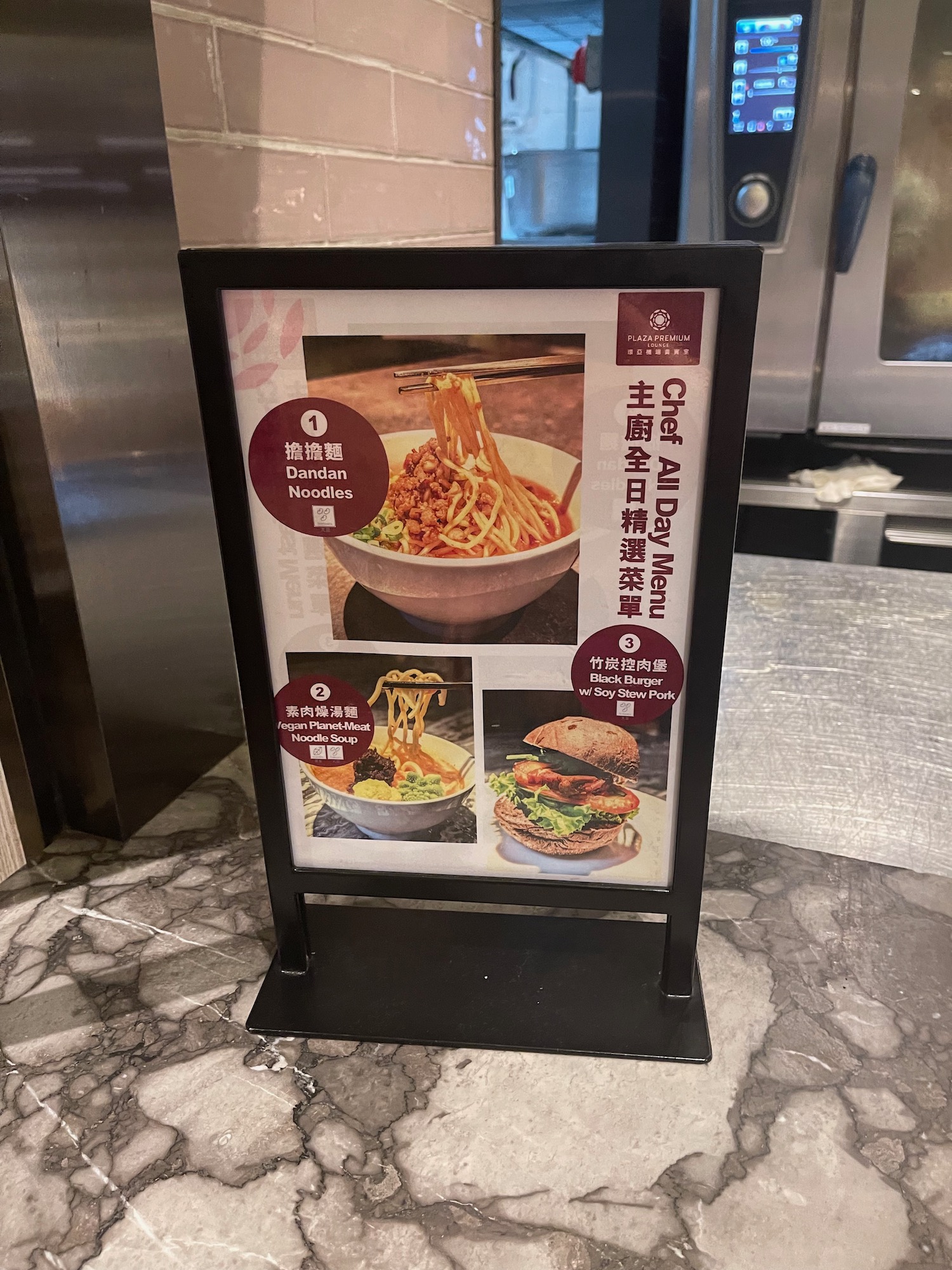 a menu sign on a counter