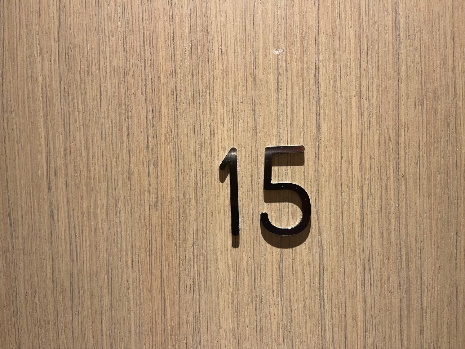 a number on a wooden surface