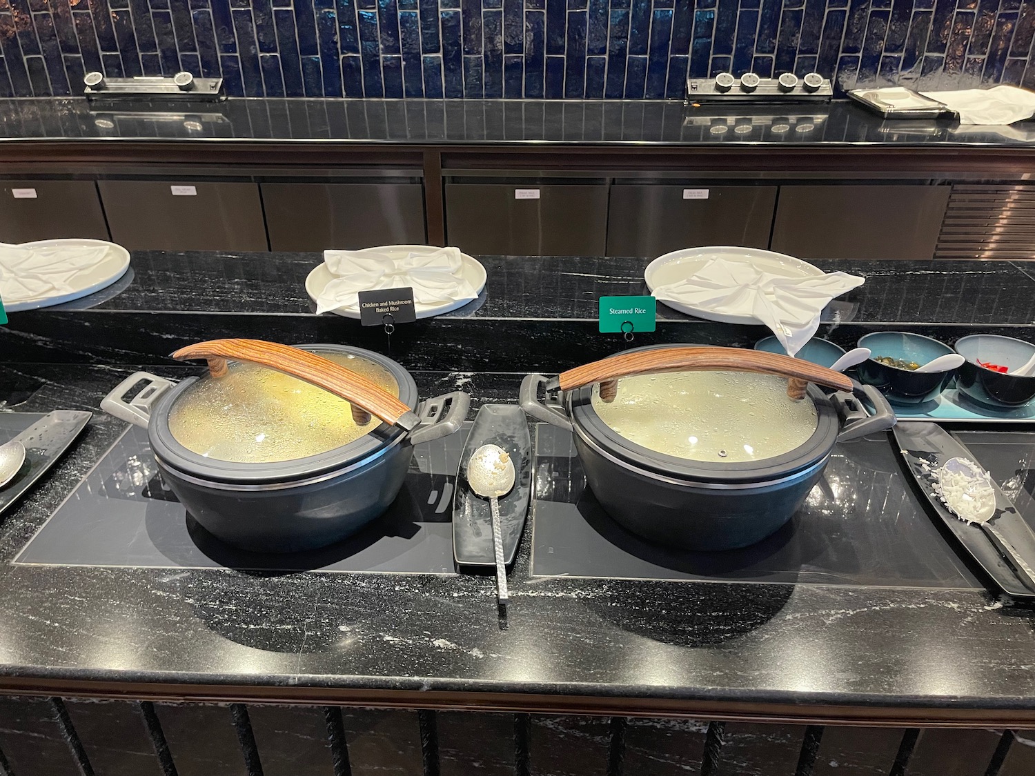 a group of pots on a counter