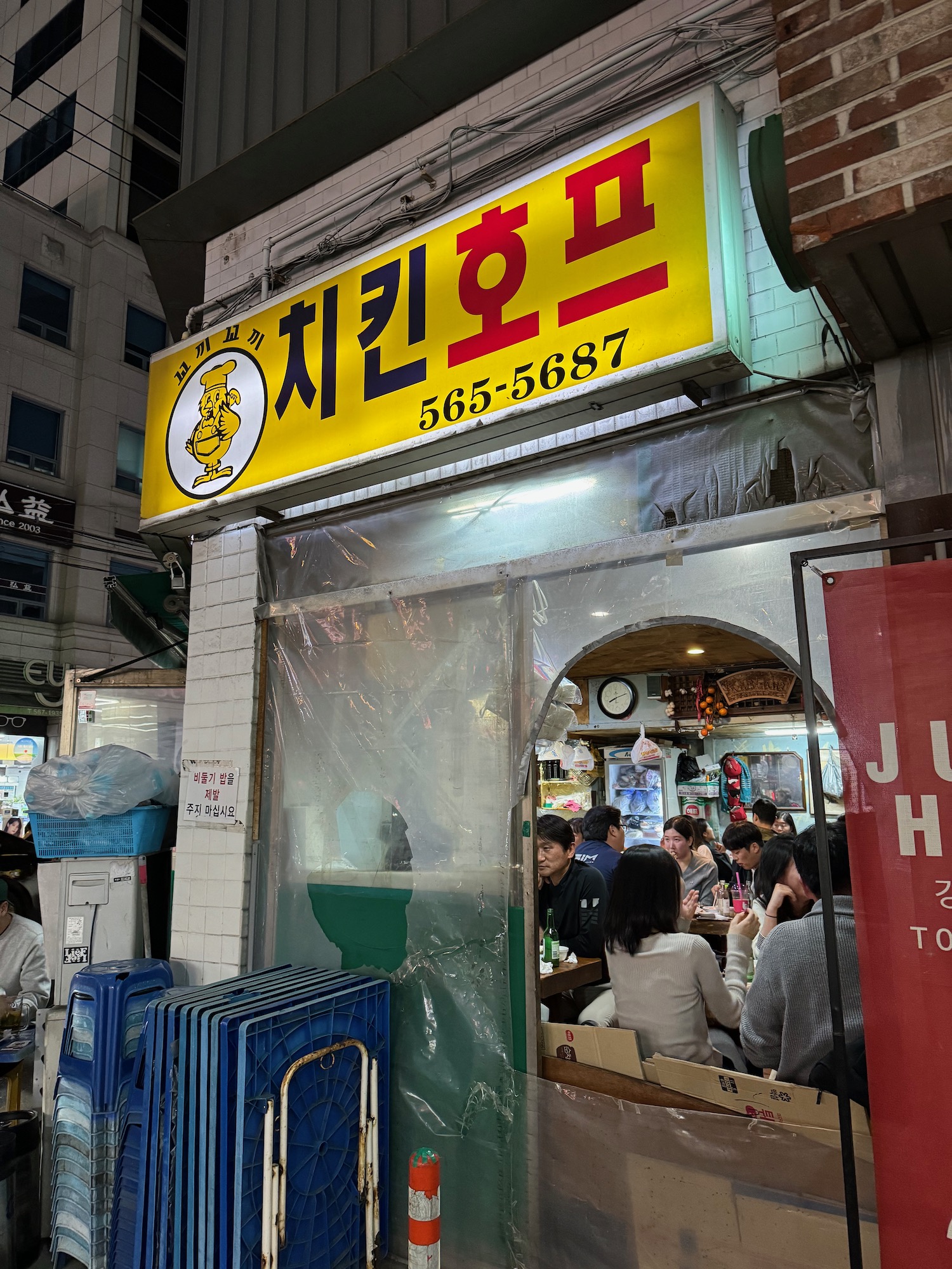 a group of people sitting at a restaurant