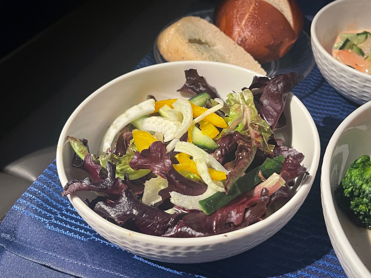 a bowl of salad on a table