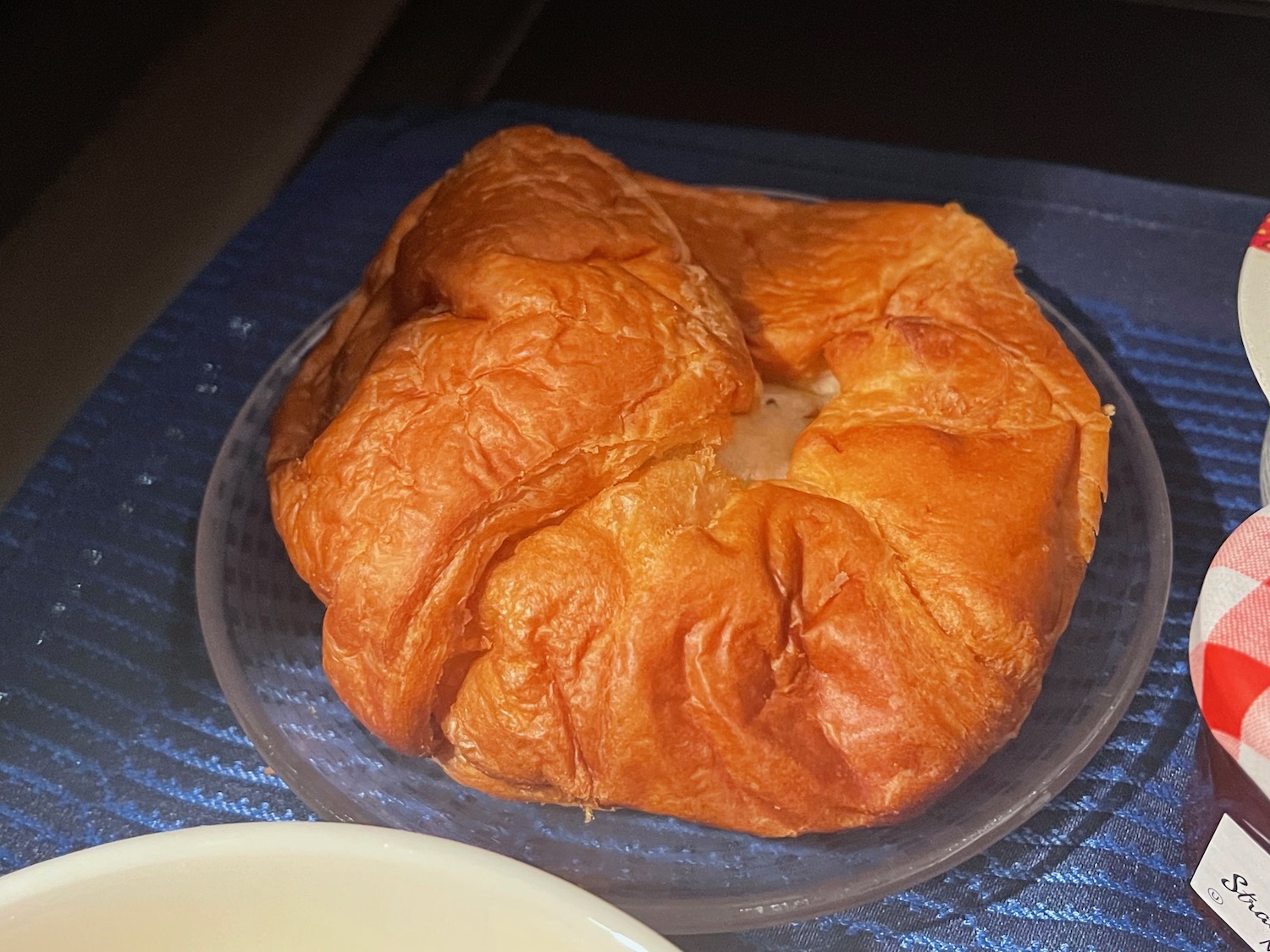 a croissant on a plate