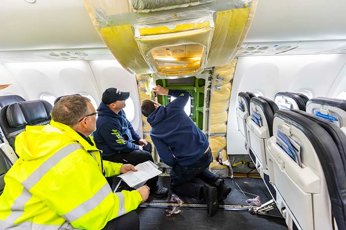 a group of men in a plane