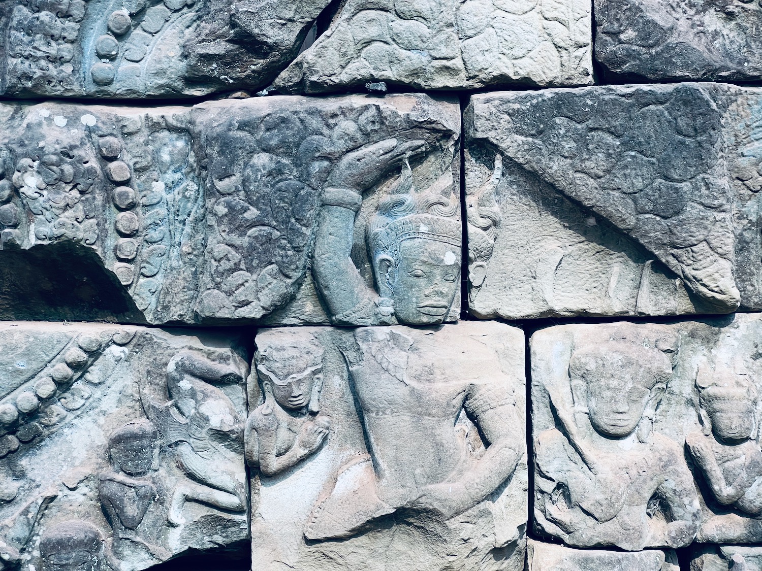 a group of stone carvings