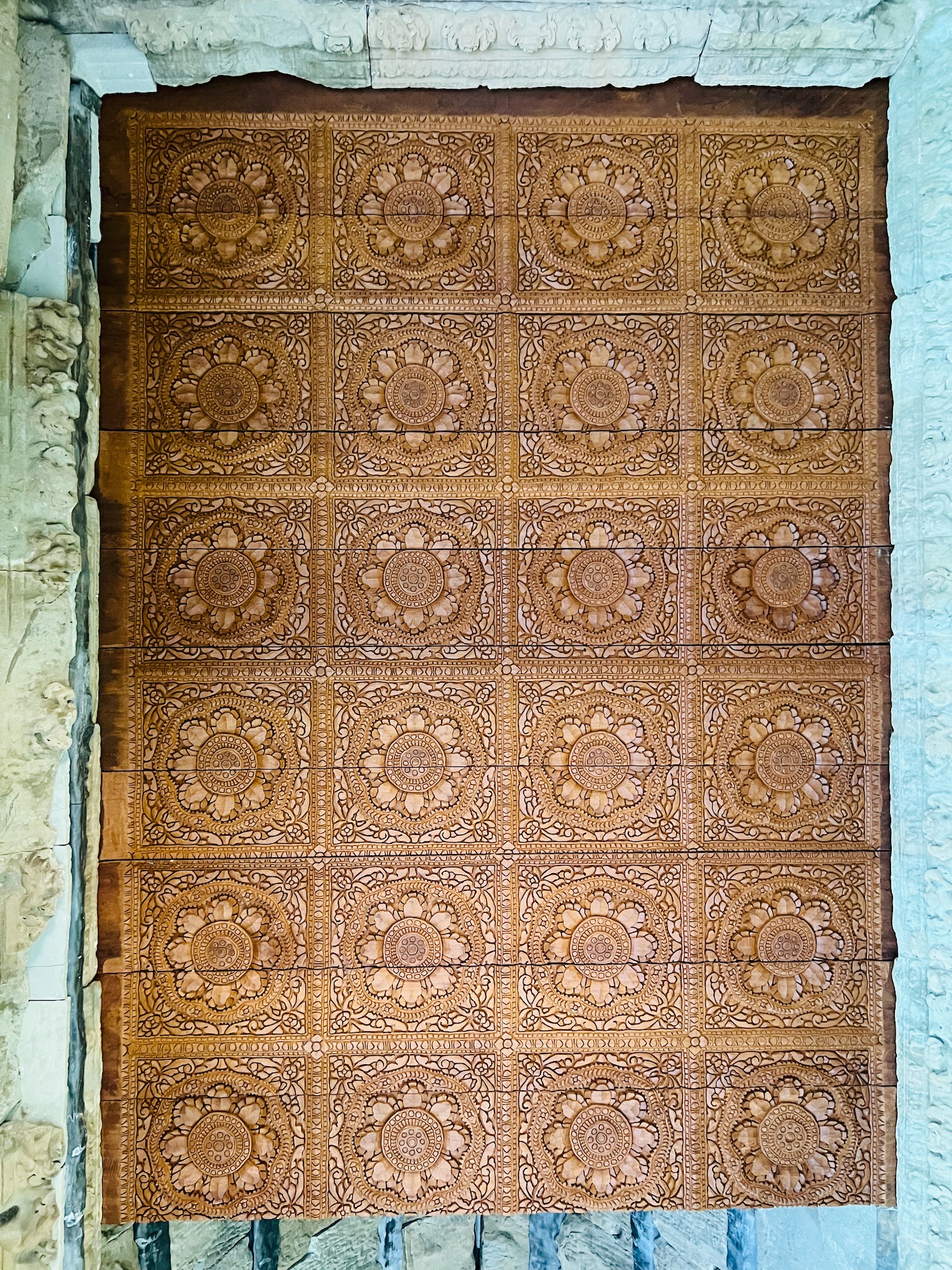 a brown tile with a blue border