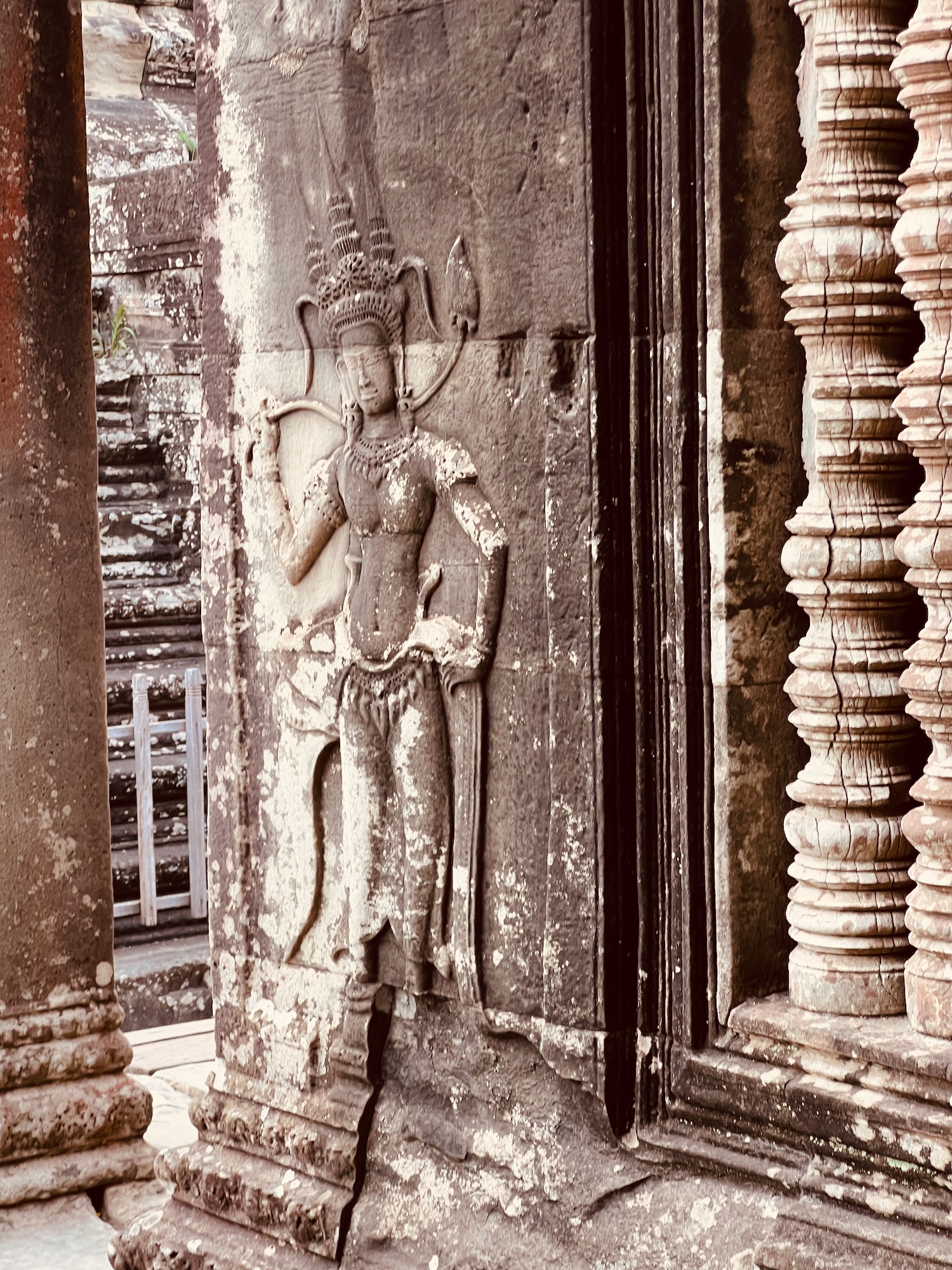 a stone carving of a man