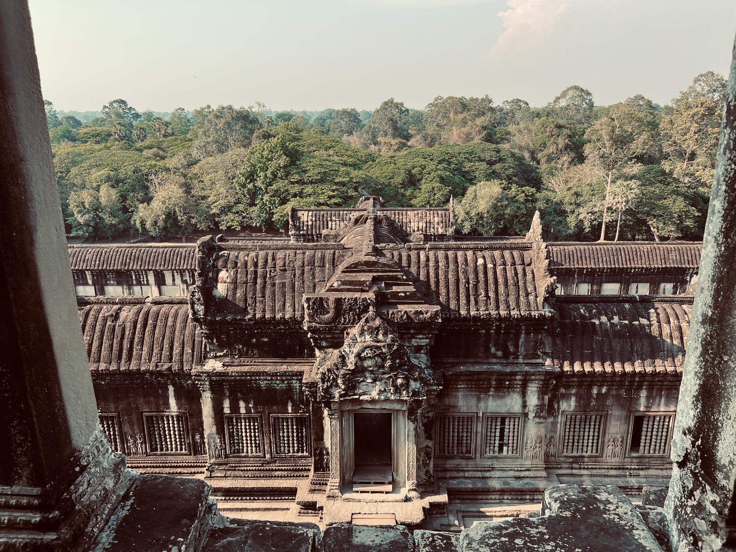 an old building with trees in the background