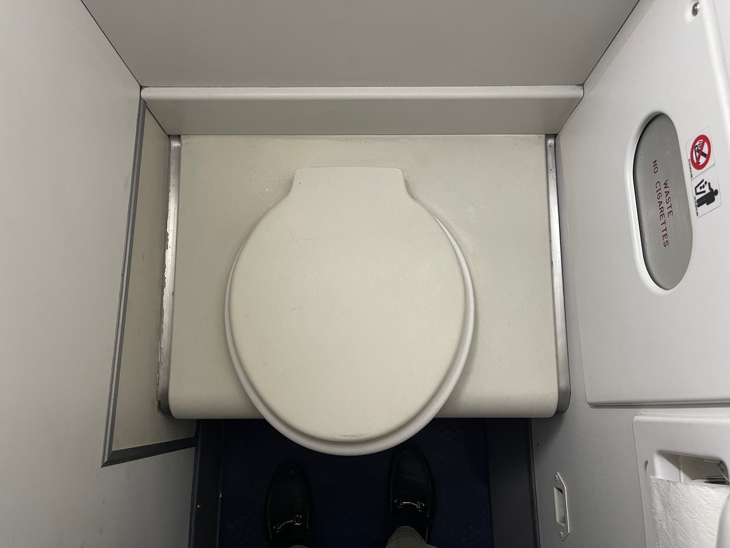 a toilet in a small bathroom