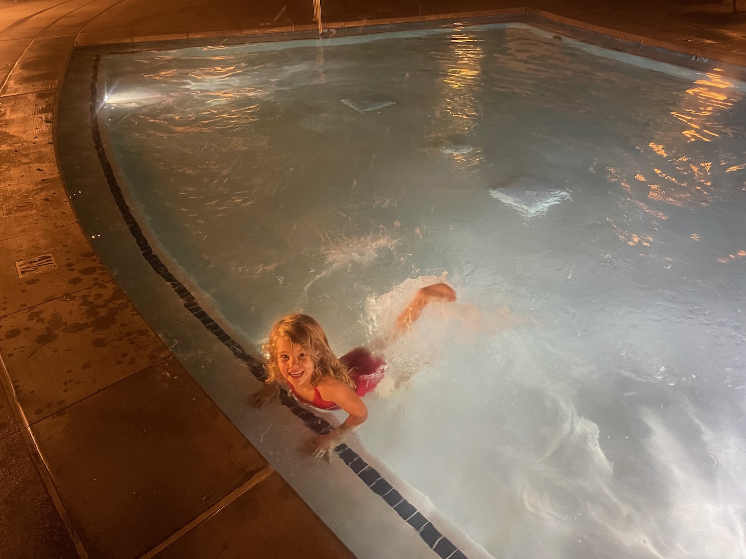 a girl in a pool