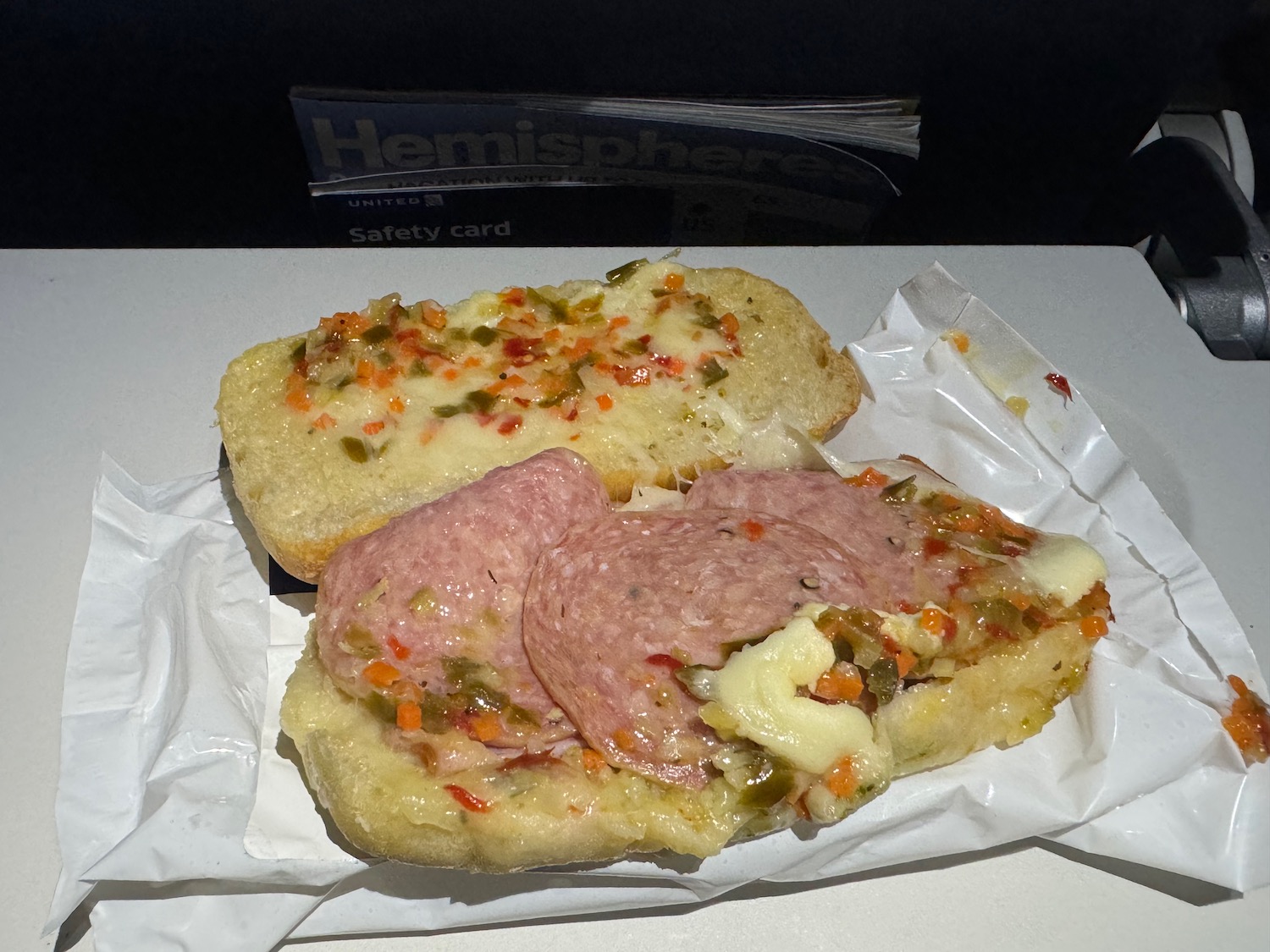 a sandwich with meat and vegetables on it