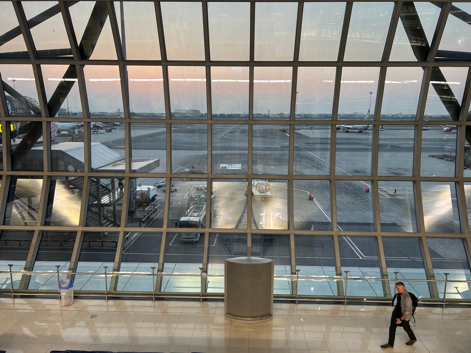 a man walking in an airport