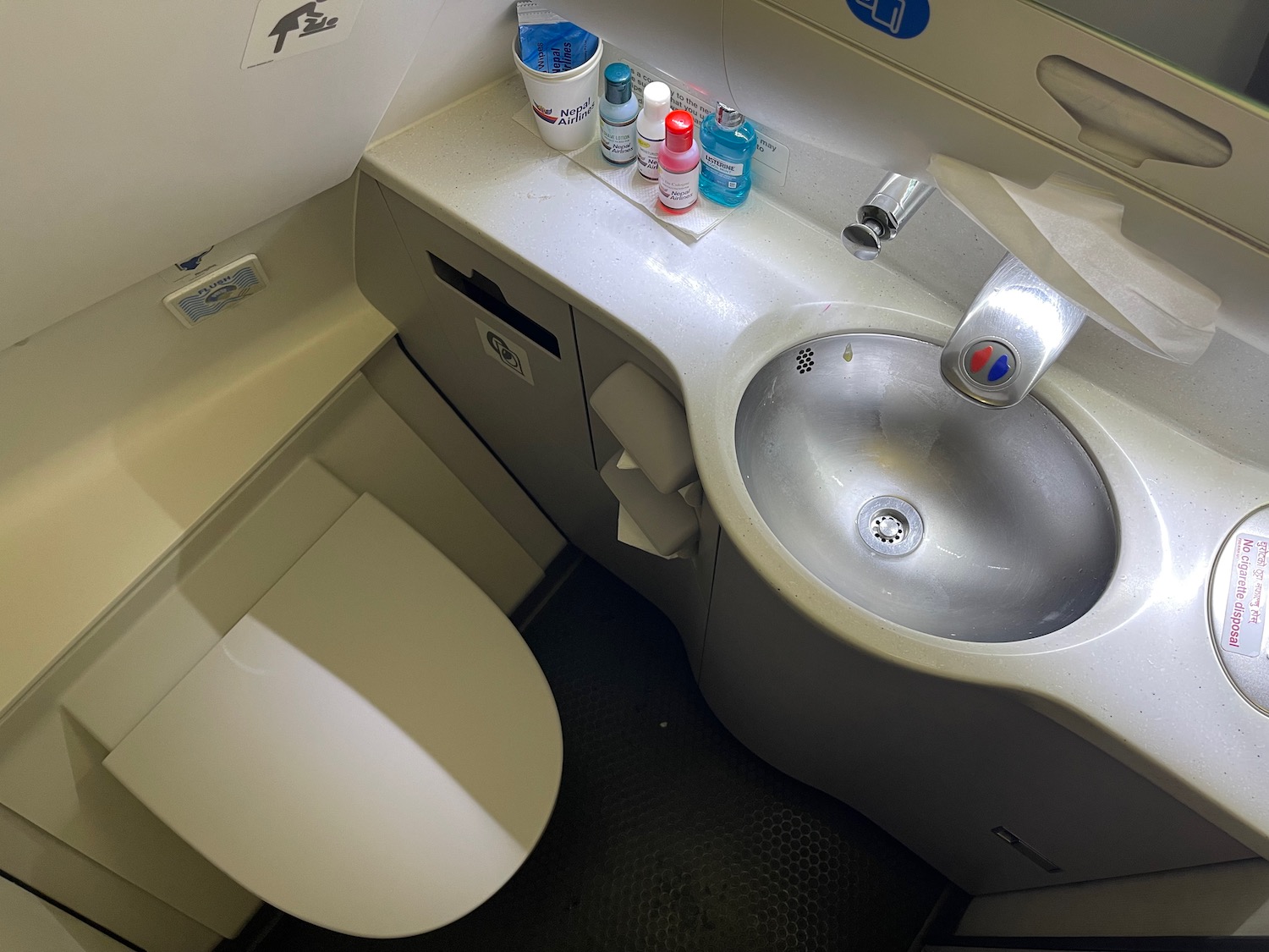 a sink and toilet in a plane