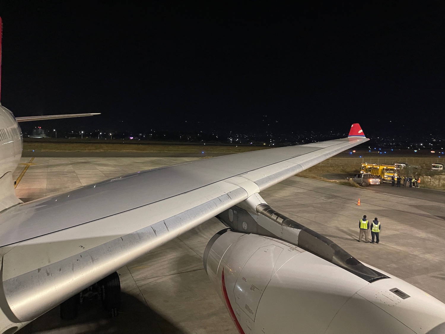 an airplane wing at night