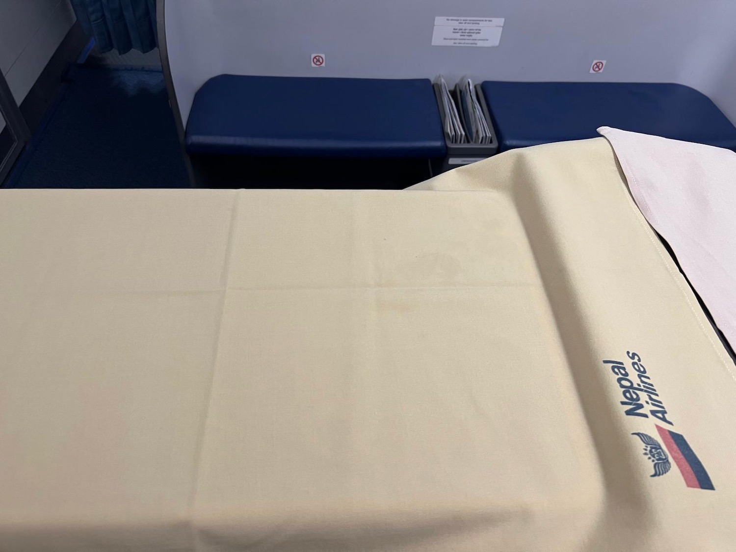 a hospital bed with a white sheet