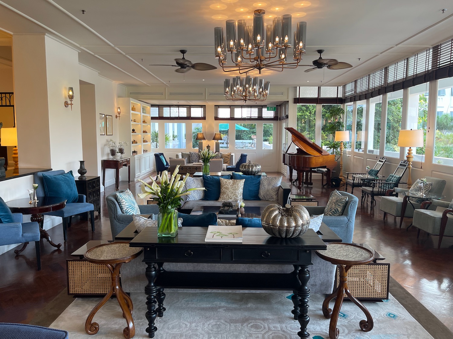 a room with a piano and a table