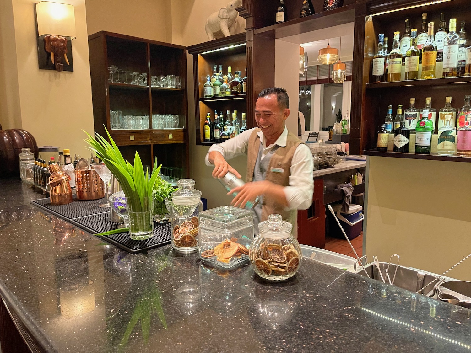 a man standing at a bar