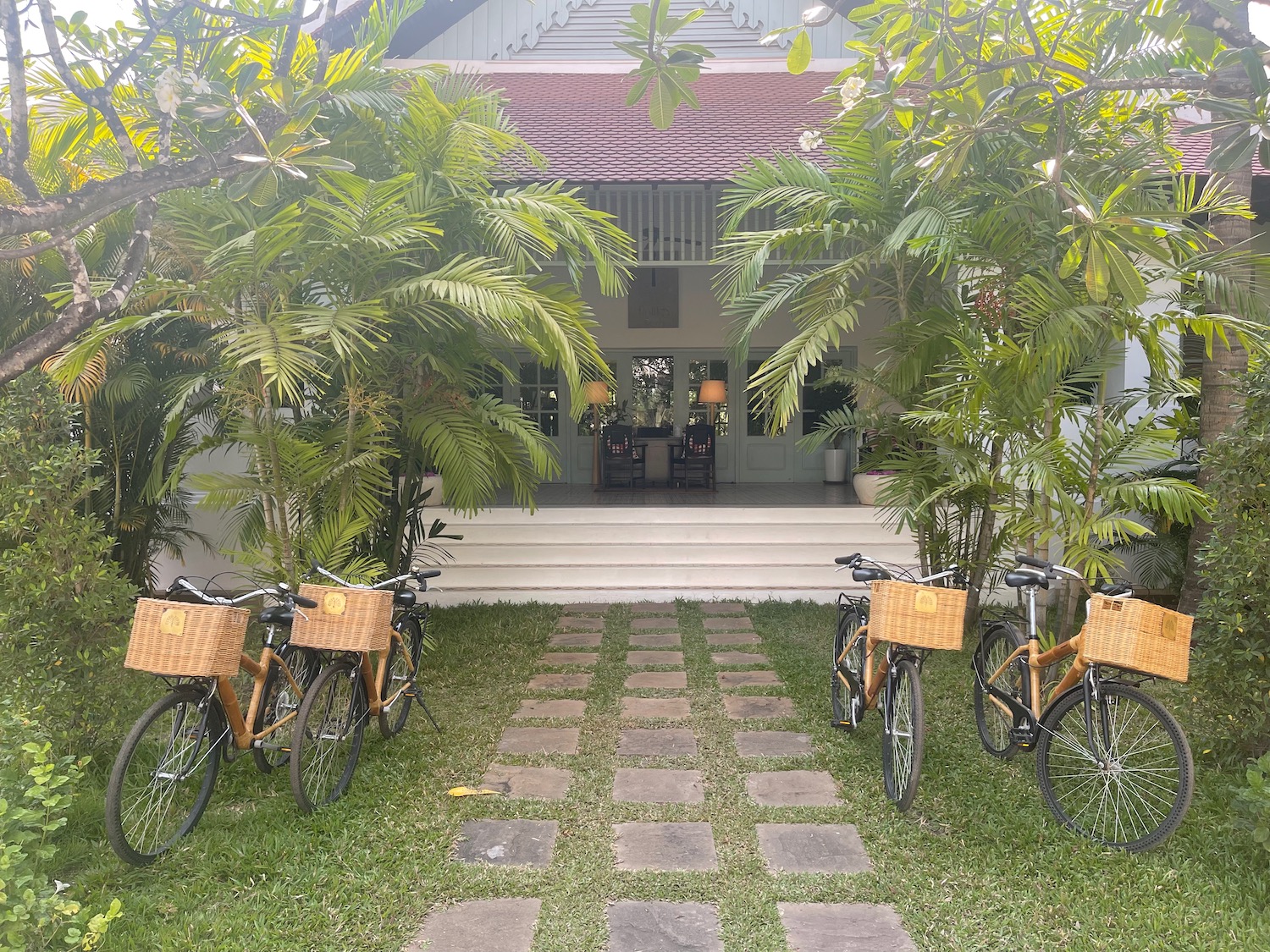 a group of bicycles parked in front of a building