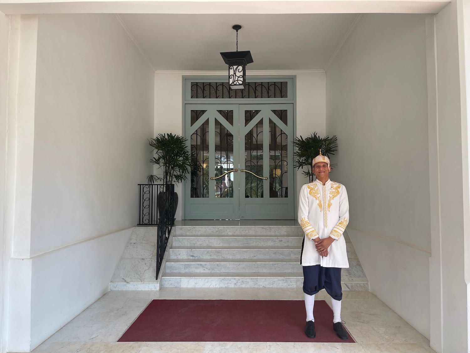 a man standing in front of a door