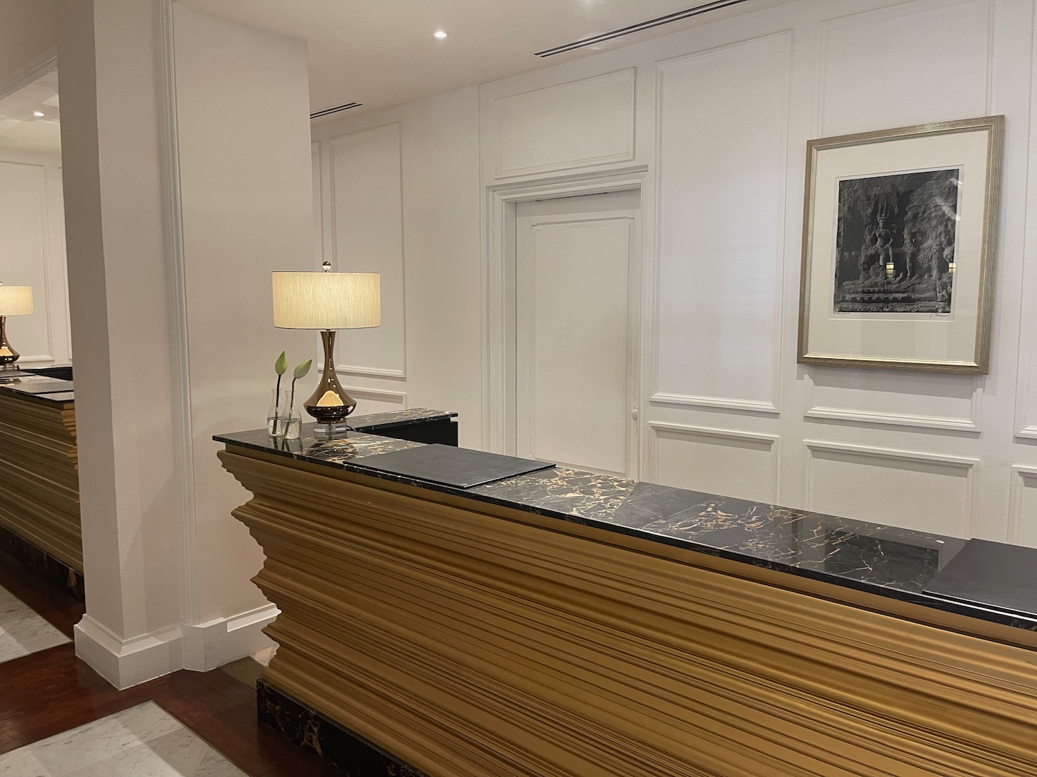 a reception desk in a hotel