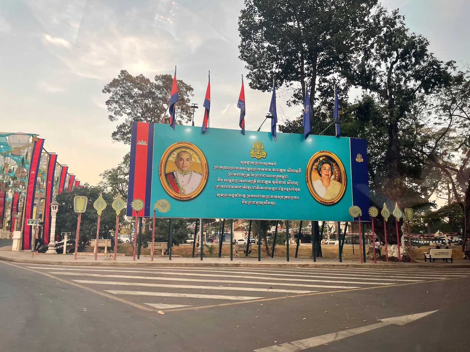 a large sign with flags on it