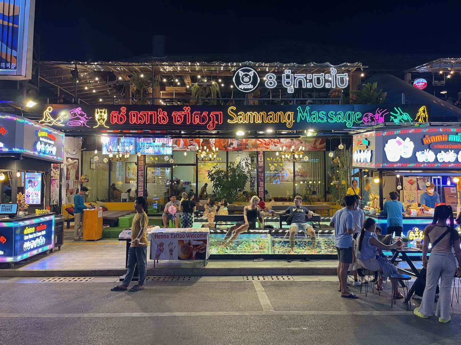 a group of people outside a restaurant