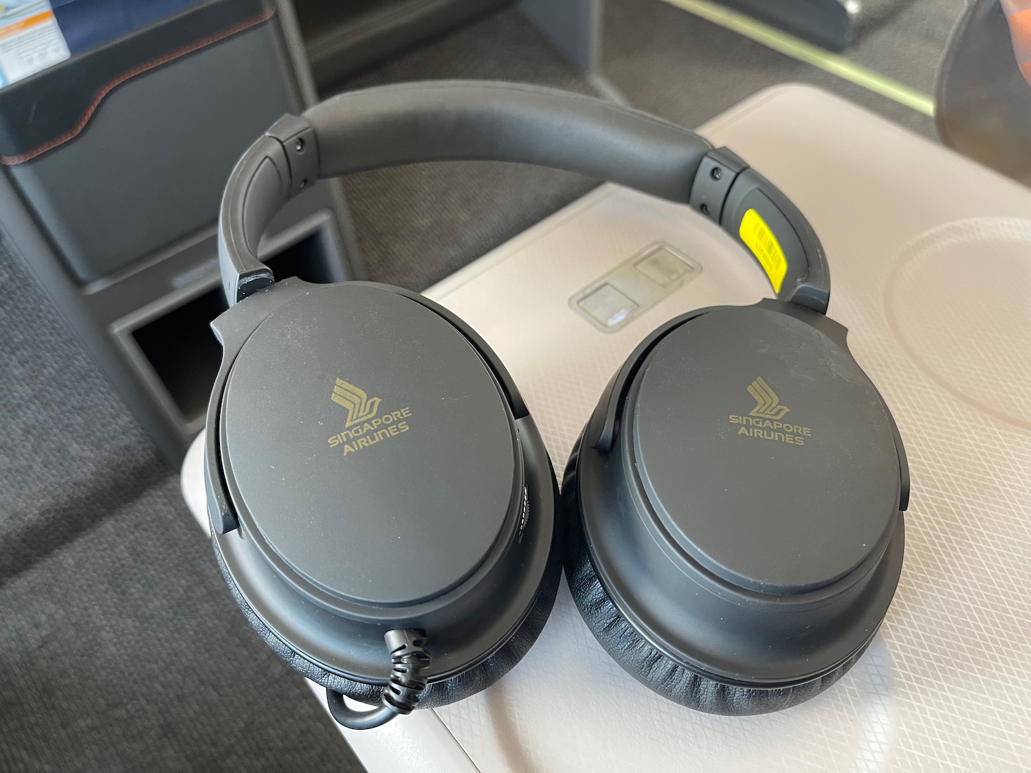 a pair of headphones on a white surface