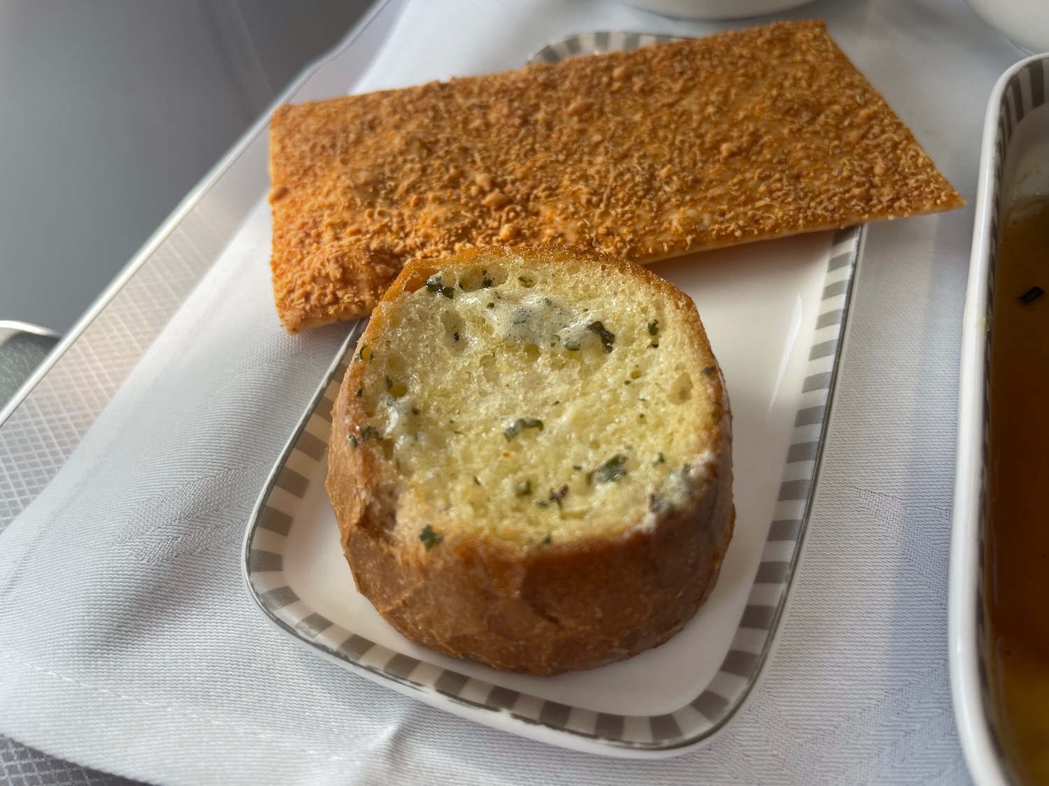 a bread and a piece of bread on a plate